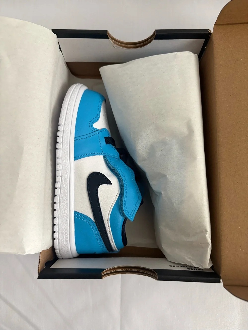 Nike Kids Low-Top Sneakers in White & Bright Blue with Navy Swoosh